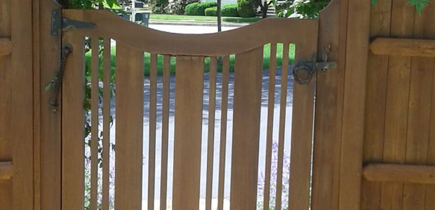 pressure-treated pine fence with teak tone sealer Fence | PT | Teak